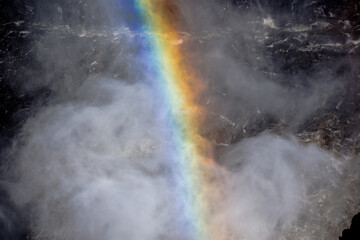 Rainbow in waterfall spray