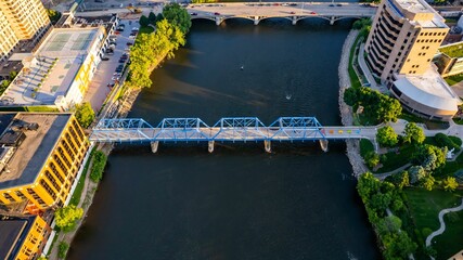 Aerial view of a bridge over water in downtown Grand Rapids