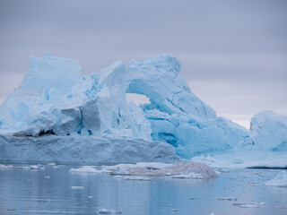 Awe-inspiring icy landscapes at the mouth of the Icefjord glacier (Sermeq Kujalleq), one of the fastest and most active glaciers in the world. Disko Bay, Ilulissat, Greenland