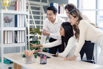 Obraz premium Young colleagues male and female group coworker in casual working at workspace office, Back to the office concept