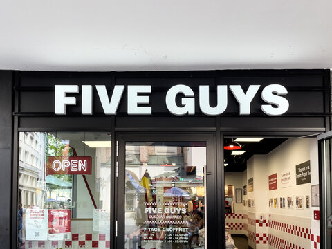 Five Guys Sign At A Five Guys Fast Food Restaurant In Munich Town Center