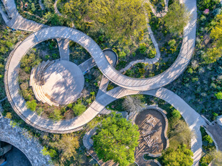 Empty park at Austin, Texas with spiral concrete pathway with small amphitheater in the middle