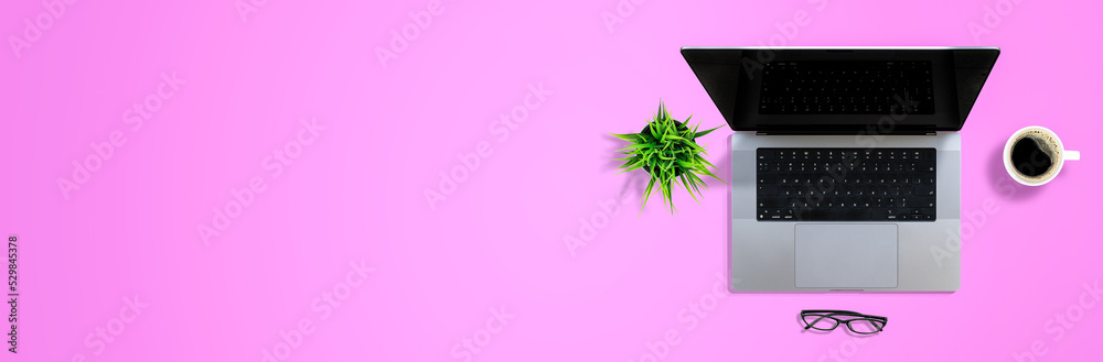 Fototapete Top view flat lay work desk table business concept with computer laptop pen glasses white cup of coffee and tree on pink love tone background empty copyspace for add text graphic advertise