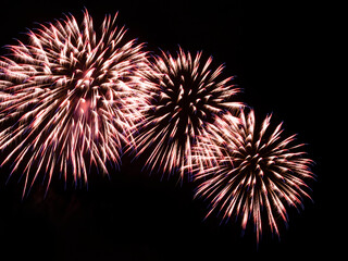Close-up of colorful fireworks in black background