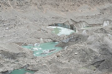 Close-up shot of small crater waters in the mountain © Ganga Raj Sunuwar/Wirestock Creators