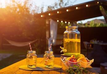 Drink station for an outdoor party. Abstract Night Festival in garden with bokeh for background...