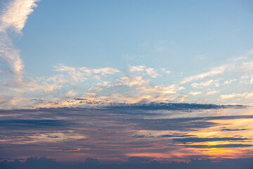 Beautiful sky at sunset, pastel shades of clouds.