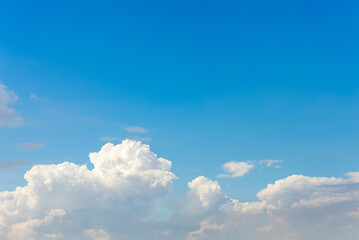beautiful blue sky and white fluffy cloud horizon outdoor for background.