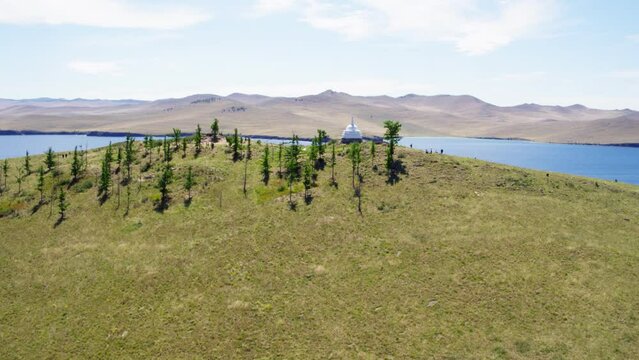 Ogoy Island with a Buddhist Stupa of Enlightenment on Lake Baikal in Siberia. Shooting from a drone