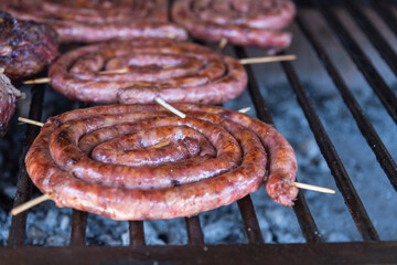 grilled sausages on the grill salchicha choriza 