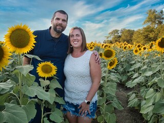 Man and Woman Posing in Kansas Sunflower Field