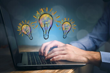 man working computer and bulb  drawing icons