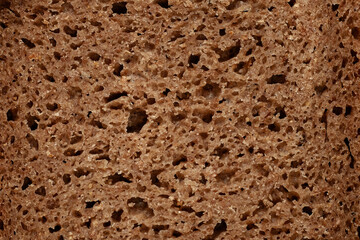 Rye black bread texture detail, whole grain bread background
