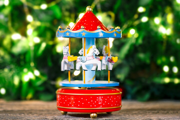 Christmas children's wooden toy carousel. Christmas and New Year concept