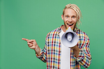 Young caucasian blond man with dreadlocks wear casual shirt hold scream in megaphone announces...