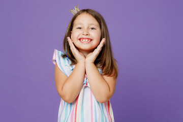 Little smiling cute pretty kid child girl 5-6 year old wears striped dress princess crown diadem...