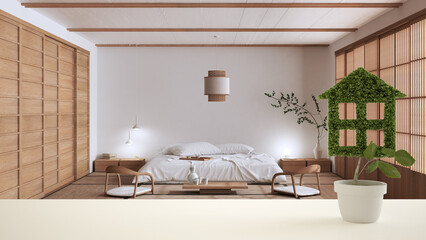 White table top or shelf with green plant in pot shaped like house, modern japandi bedroom in the background, interior design, real estate, eco architecture concept idea
