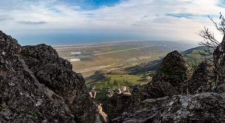 Fototapeta na wymiar Beautiful view from Beshbarmak rock massif to the Caspian sea. Azerbaijan.