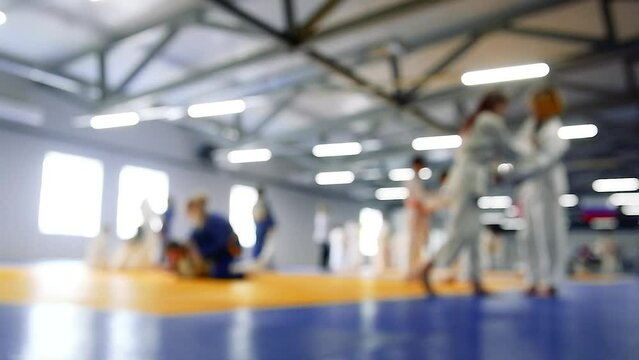 Children are exercising. Judo. Blurred.