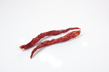dried red hot peppers isolated on white background