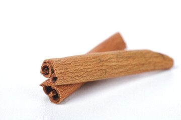 cinnamon sticks isolated on white