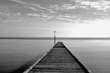 wooden pier on the beach Black and white, Llandudno