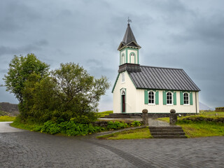 Fototapeta na wymiar Þingvellir (Thingvellir) church (Thingvallakirkja church) a site of historical, cultural, and geological significance in Iceland lying in a rift valley that marks the crest of the Mid-Atlantic Ridge