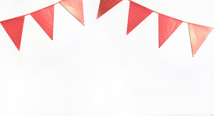 Obraz premium festive background with white wall decorated with holiday flags