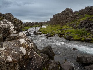 Fototapeta na wymiar Awe-inspiring view of the Silfra a rift formed by the Mid-Atlantic Ridge as the North American and Eurasian tectonic plates diverge. Thingvellir National Park, Iceland