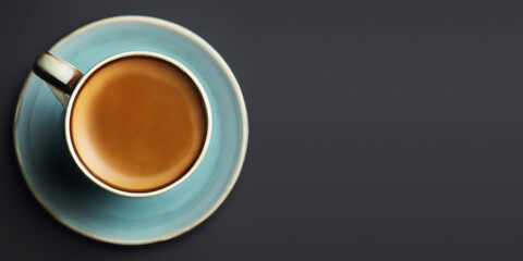 Coffee cup top view on gray with copyspace