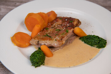 Recipe for baked lamb shoulder with watercress mashed, sweet potato and carrot, pepper sauce,...