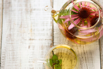 Cup of herbal tea from echinacea and mint used in alternative medicine a an immune system booster. Top view