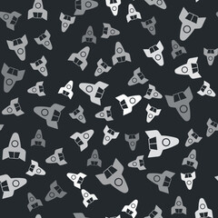 Grey Rocket ship icon isolated seamless pattern on black background. Space travel. Vector