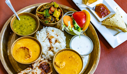 North Indian style vegetarian thali served in a restaurant - obrazy, fototapety, plakaty