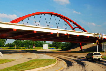 The red Front Door Bridge, in Columbus, Indiana, carries traffic of Interstate 65 through the...