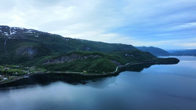 Drone view of a beautiful green shore in Fauske municipality, Norway