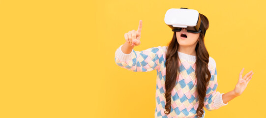 amazed teen girl wear vr glasses using technology for education in virtual reality, virtual world. Banner of child girl with virtual reality vr headset, studio portrait with copy space.
