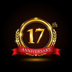 17th golden anniversary template design, with shiny ring and red ribbon, laurel wreath isolated on black background, logo vector