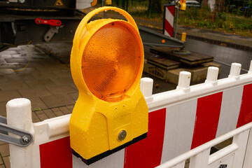 orange warning light on barrier