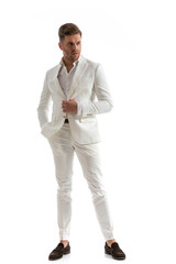 stylish man with open collar shirt holding hand in pocket