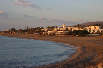 Mojacar, Almeria: Beautiful sunset panorama on the beach and white building background.  Andalucia, Spain 