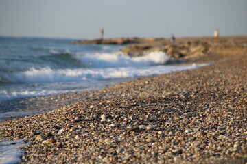 abstract blurred background pebble beach landscape 