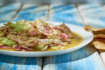 Aguachile, shrimp dish in lemon juice and green sauce, mexican seafood.