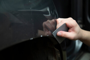 Armoring with a protective film of the car body.Protection of the paintwork of the car.
