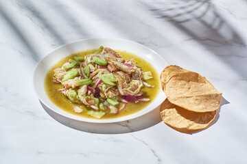 Traditional aguachile from sinaloa, mexico. Shrimp in green sauce.