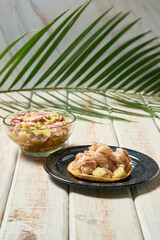 Traditional aguachile from sinaloa, mexico. Shrimp in green sauce.