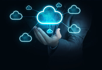 Modern Cloud networking futuristic concept Background wallpaper with businessman's hand. New world tech backdrop