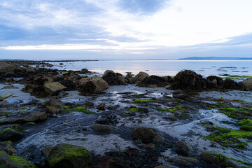 View on the North Atlantic Ocean from the beaches of Ireland near the city Galway in the morning, golden hour and blue hour.