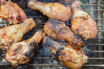 grilled chicken drumsticks with crust, close-up