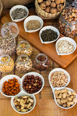Assortment of nuts on rustic wood table